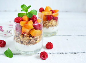 image of raspberries, yogurt & mint in a glass